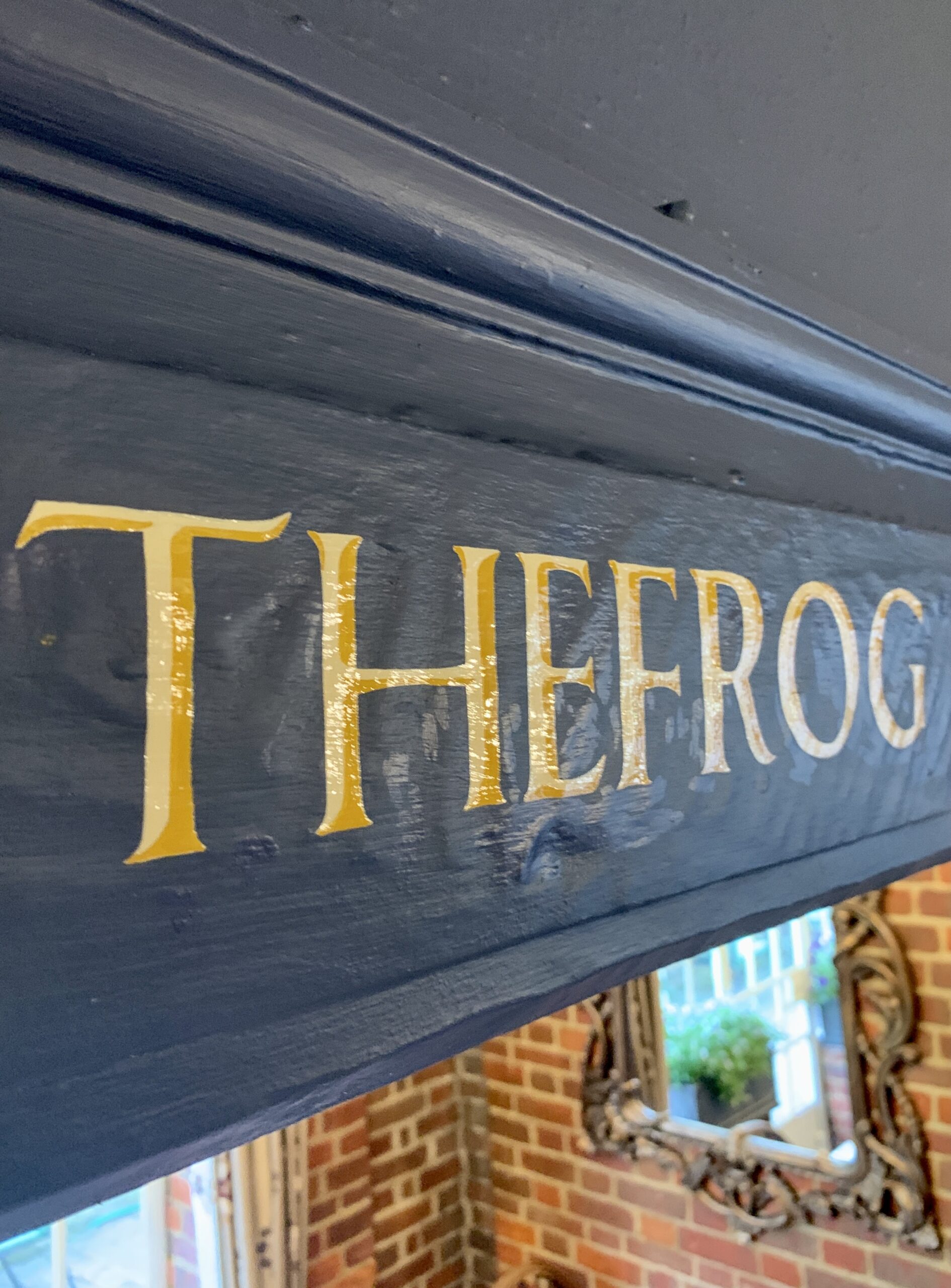 Traditionally hand-painted interior signwork at The Frog in Skirmett